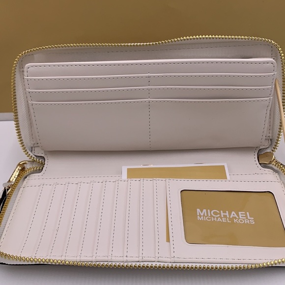 MICHAEL KORS LARGE TRAVEL CONTINENTAL WRISTLET WALLET OPTIC WHITE COLOR - Picture 13 of 16